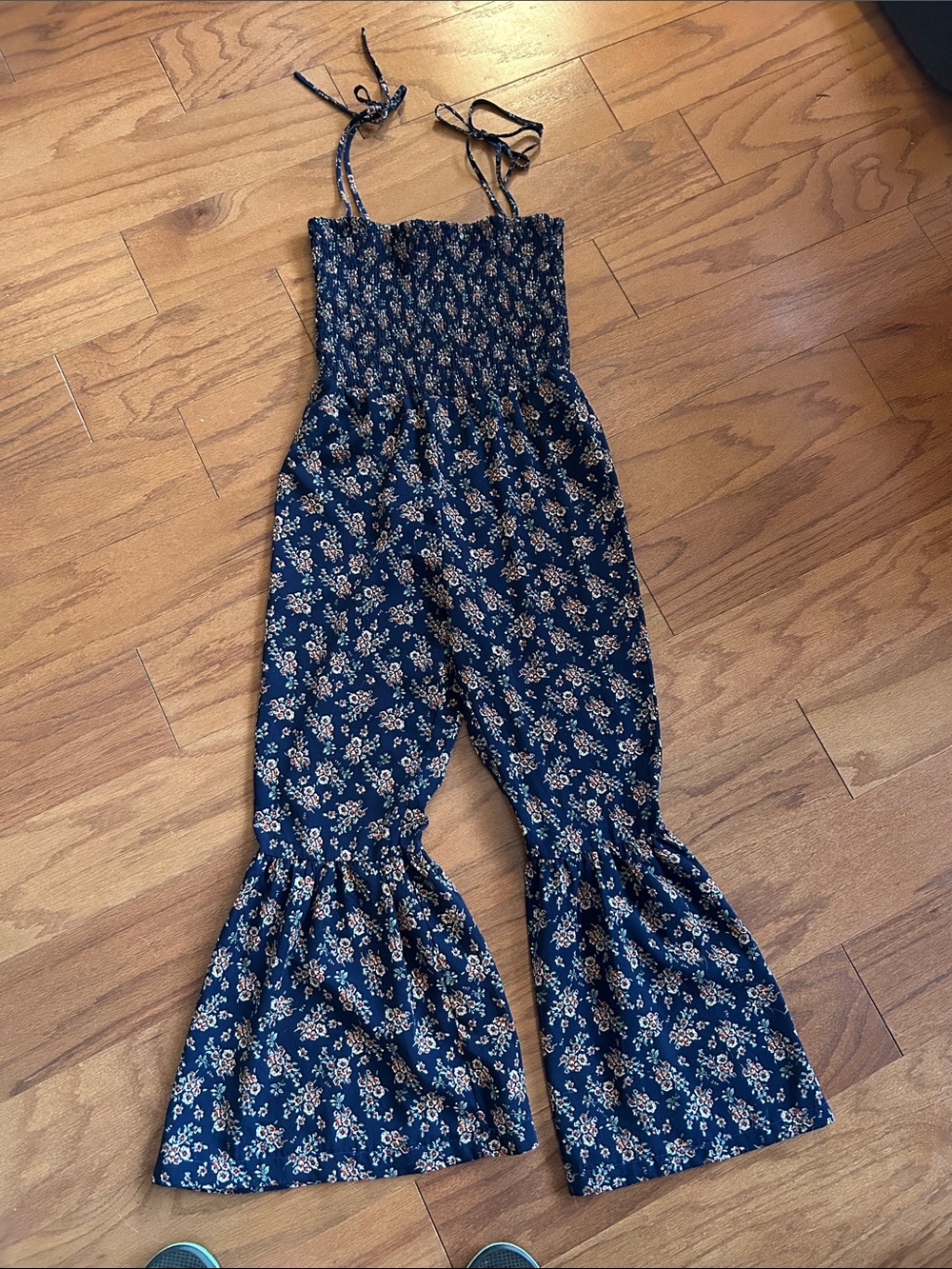 Promesa Navy Floral Smocked Jumpsuit with Ruffled Bell Legs